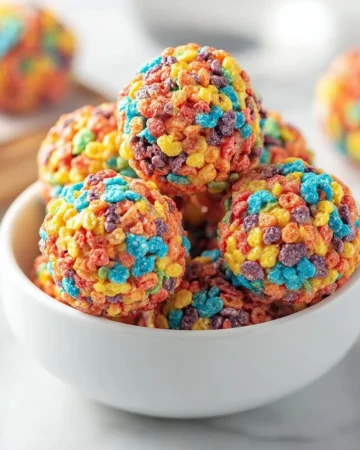 Fruity Pebbles cookies with colorful cereal pieces and a soft texture