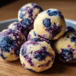 Blueberry cheesecake protein bites, a healthy and delicious snack option.
