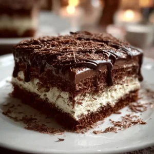 Creamy layered chocolate dessert with rich chocolate layers and whipped cream