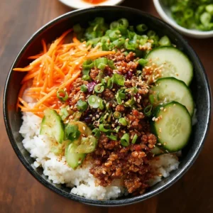 Delicious Korean Ground Beef Bowl garnished with vegetables and sesame seeds