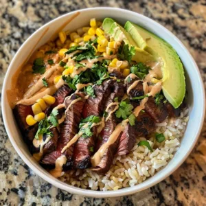 Delicious chipotle steak bowl with marinated steak, cilantro lime rice, and vegetables