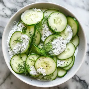 Greek yogurt ranch cucumber salad with fresh veggies and herbs in a bowl