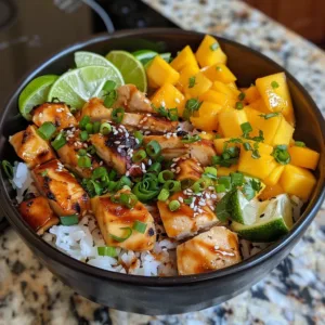 Delicious Mango Chicken Rice Bowl with chicken, mango, and rice.