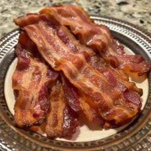 Thick cut oven bacon cooked to perfection, crispy and delicious.