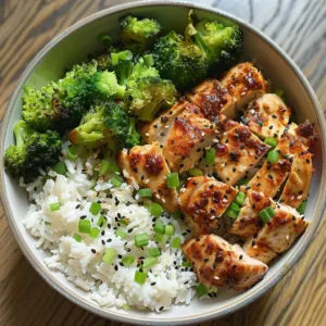 Delicious classic chicken and rice bowls garnished with herbs and spices.