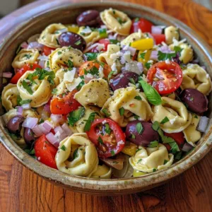 Colorful Italian tortellini salad with fresh vegetables and dressing