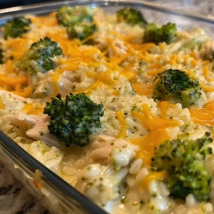 Delicious Chicken Broccoli Casserole fresh from the oven with rice and vegetables